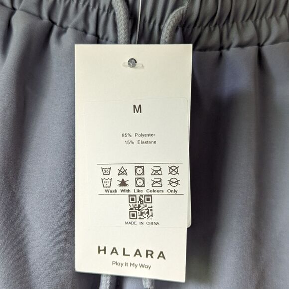 Halara Mid Rise Side Pocket Drawstring Cut Out 2-in-1 Shorts Size M NWT - Picture 11 of 12